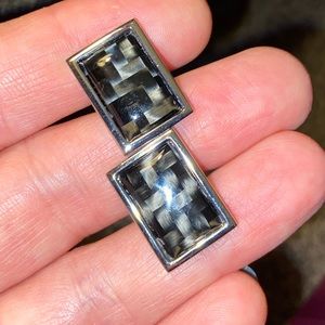 Square silver and black cufflinks.